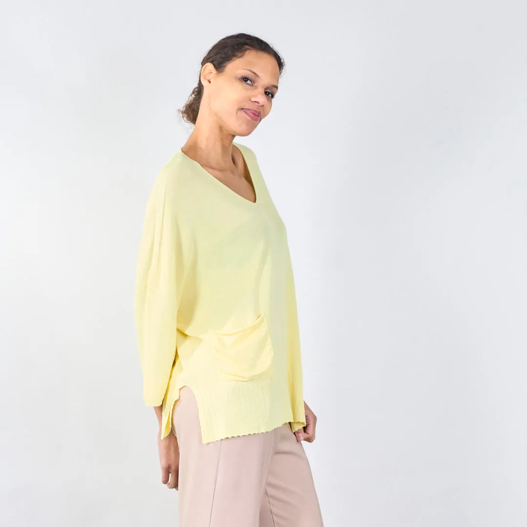 Relaxed v-neck sweater with pocket detail wholesale
